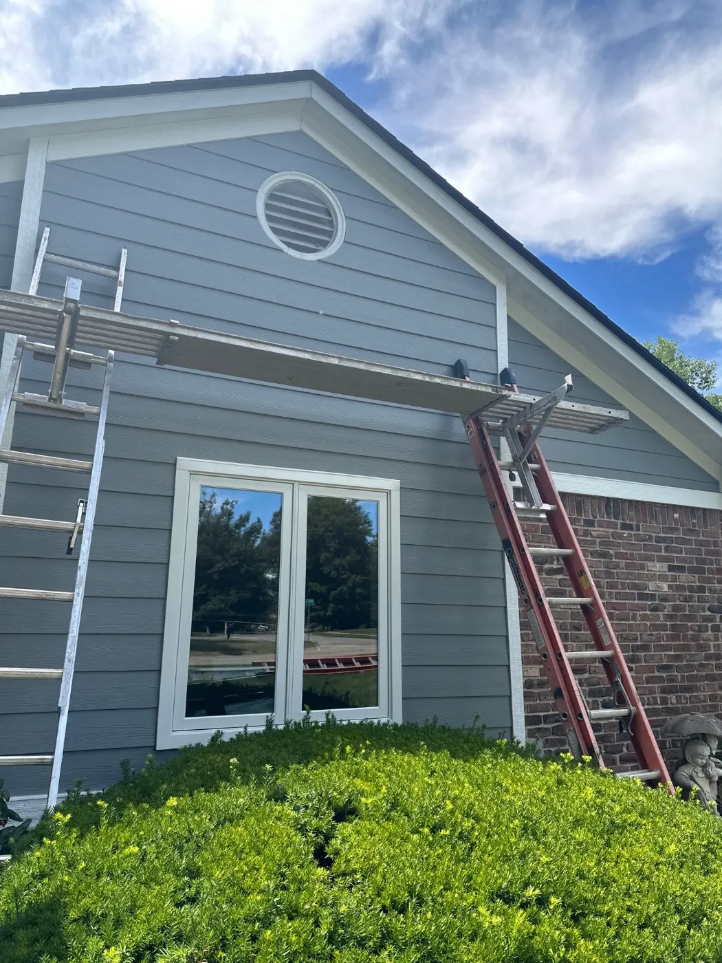 Siding installation documented in Mohawk Crossing